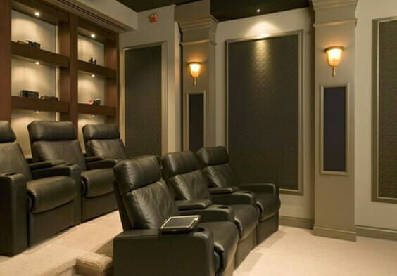 Use layered treatments for blackout in a home theater