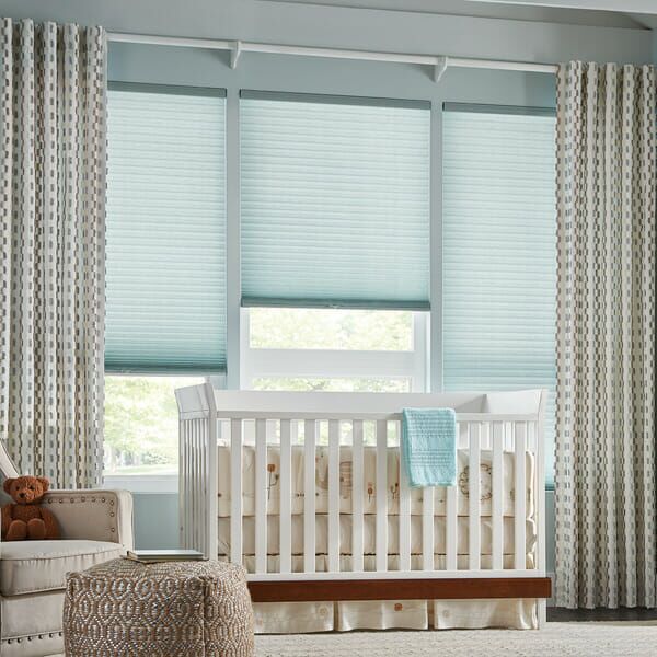 Drapes in front of cellular shades
