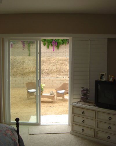 Shutters on sliding glass door.